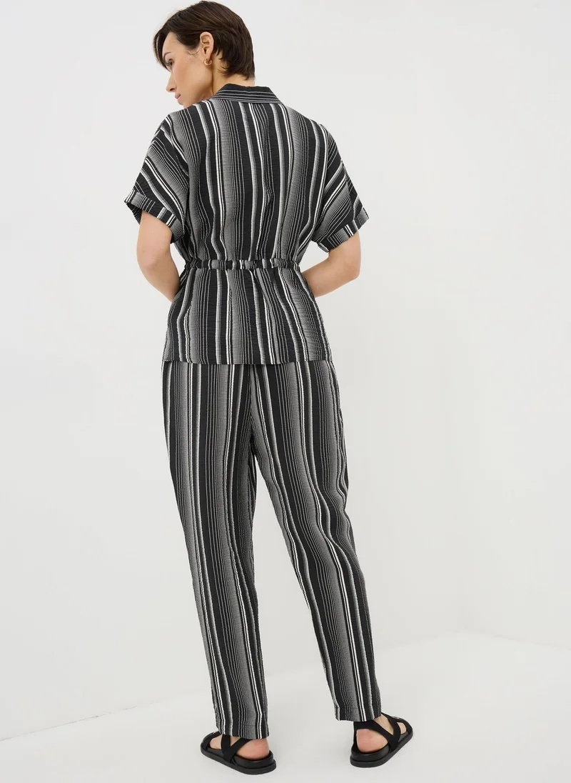 اشتري ماتلان Black/White Black Stripe Airflow Tapered Co Ord Trousers للنساء في الإمارات