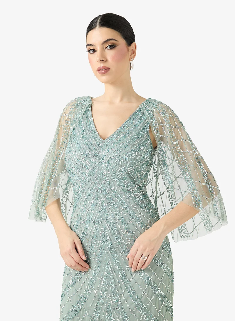 فستان سهرة مزين بالترتر