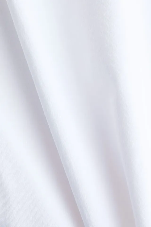 تي-شيرت بقصة واسعة – صورة 2