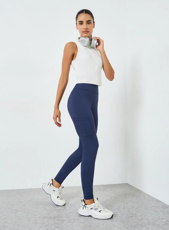 Women's Side Pocket Knee Rubber Logo Leggings