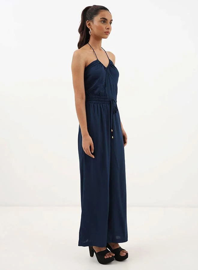 Midnight Muse Halter Jumpsuit
