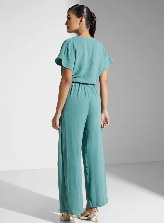 Green Surplice Neck Short-Sleeve Jumpsuit with Adjustable Tie Detail – image 2