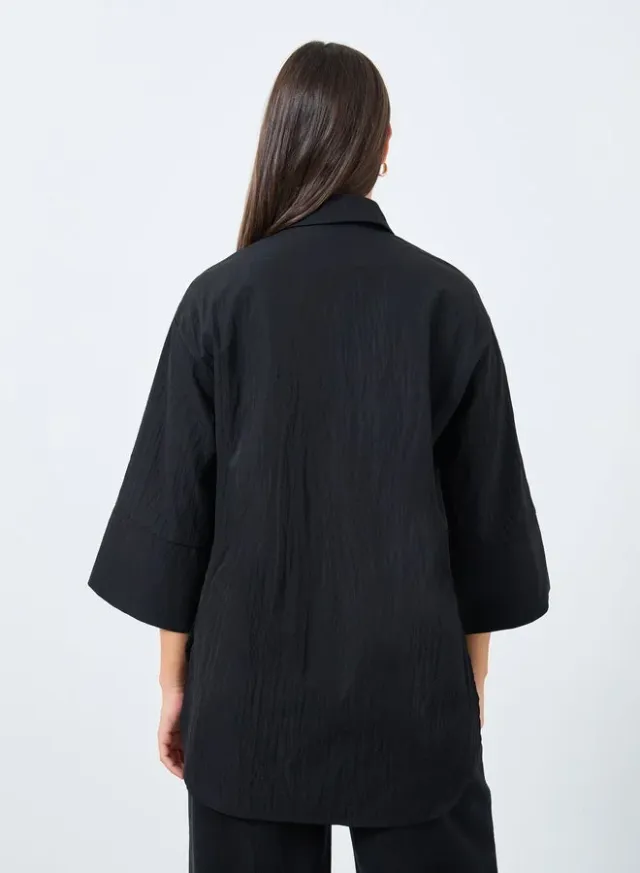 بلوزة فضفاضة بتفاصيل أربطة – صورة 4