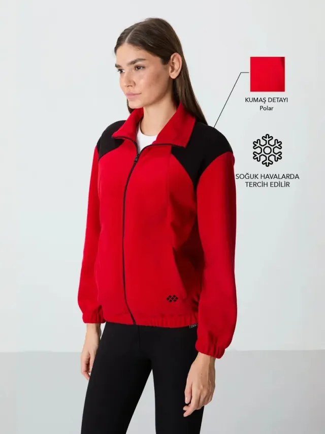 سويت شيرت TOMMY بتصميم كتل ألوان وقصة واسعة وياقة بسحاب