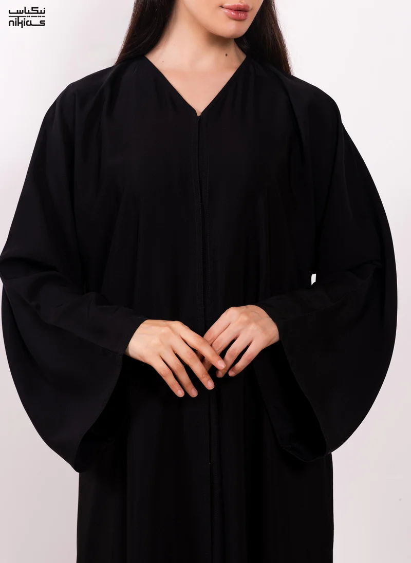 Nikias Elegant plain Nida fabric abaya with full front buttons