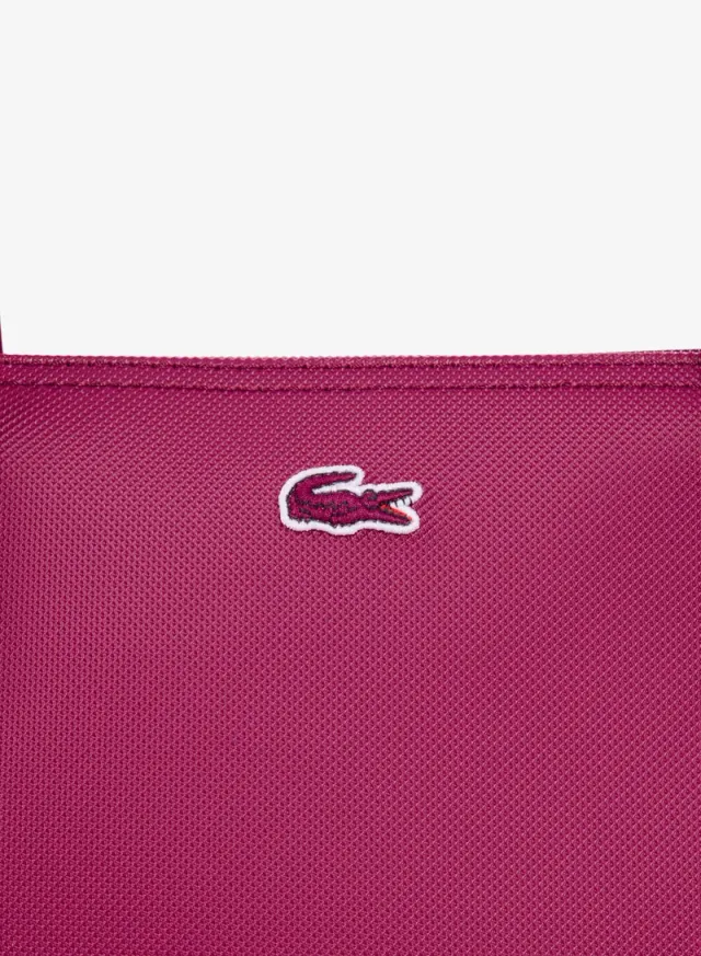 The iconic L1212 style in a large shopping bag – image 4