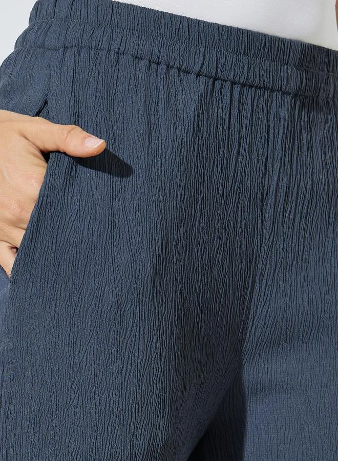 بنطال بقصة أرجل واسعة