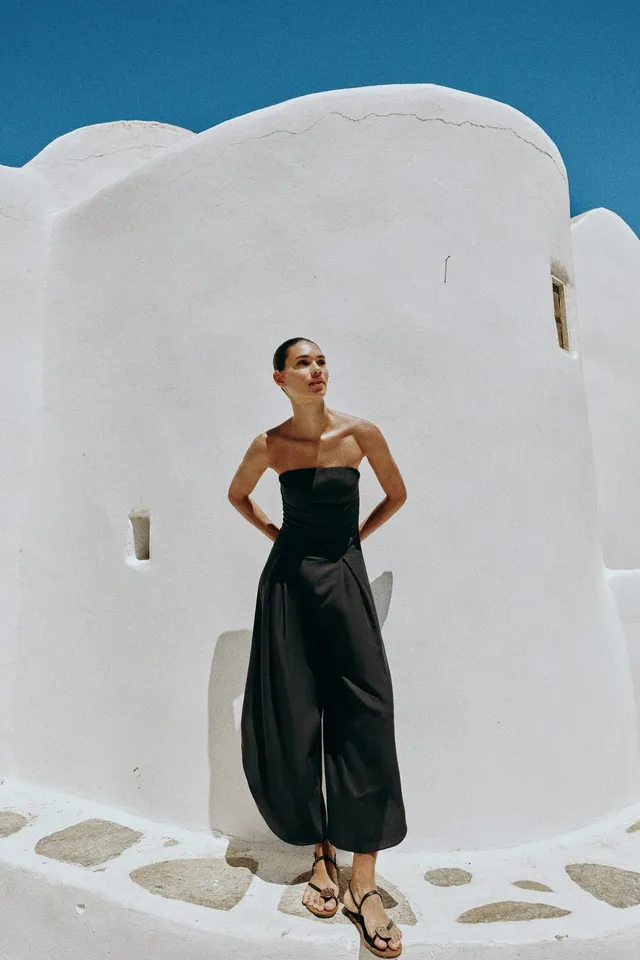 Off-the-Shoulder Midi Jumpsuit with Asymmetric Hem and Front Pleats