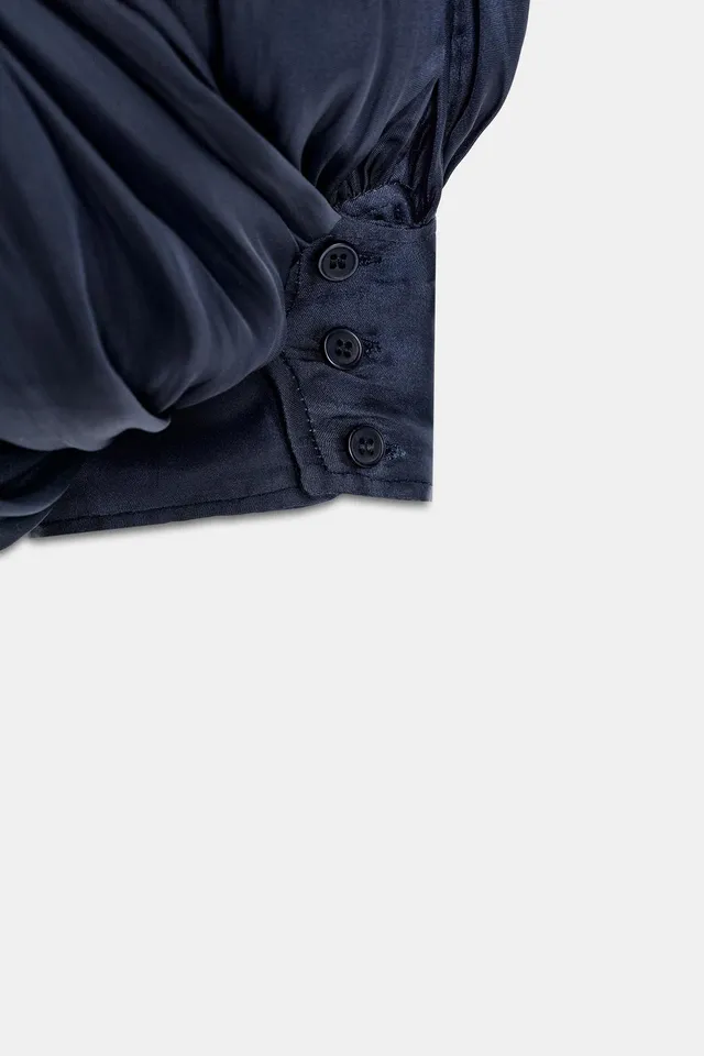 Satin Halter Jumpsuit with Open Back and Cuffed Hem – image 10