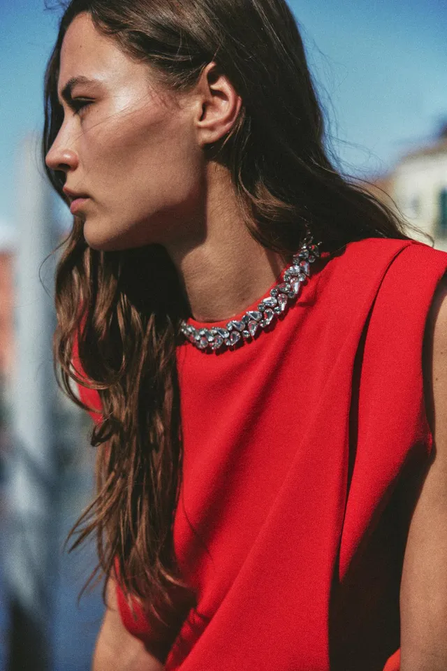 Sleeveless Top with Jewel Neck, Shoulder Pads, and Front Pleats – image 4