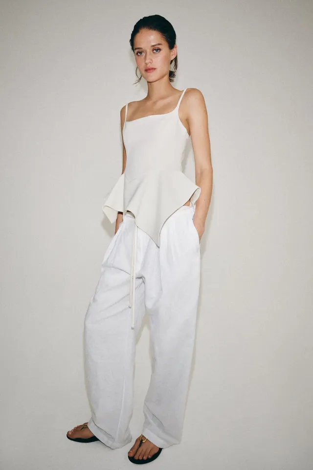 Women's Sleeveless Peplum Top with Adjustable Straps and Asymmetric Hem – image 5