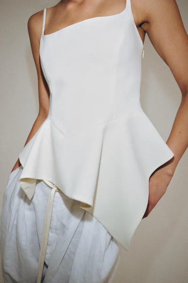 Women's Sleeveless Peplum Top with Adjustable Straps and Asymmetric Hem – image 6
