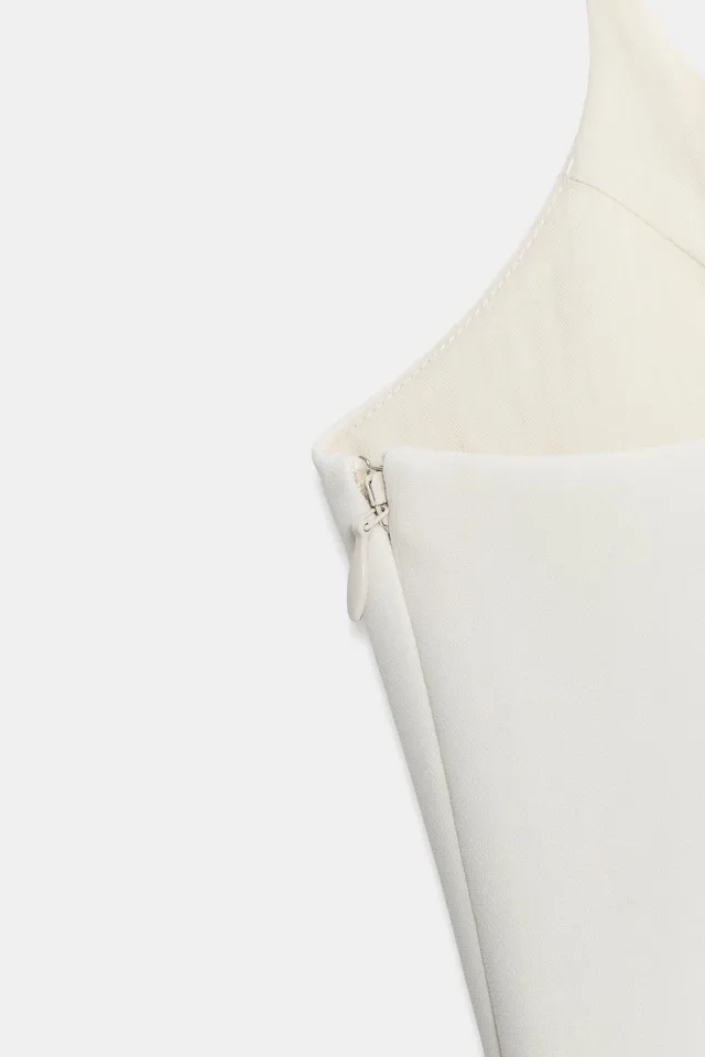 Women's Sleeveless Peplum Top with Adjustable Straps and Asymmetric Hem – image 9