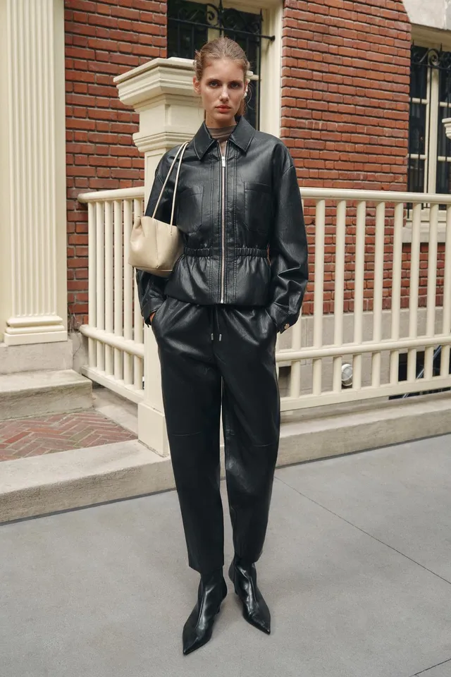LEATHER EFFECT JACKET WITH ELASTICATED WAIST
