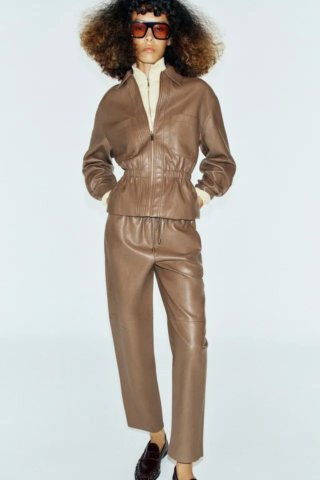 LEATHER EFFECT JACKET WITH ELASTICATED WAIST