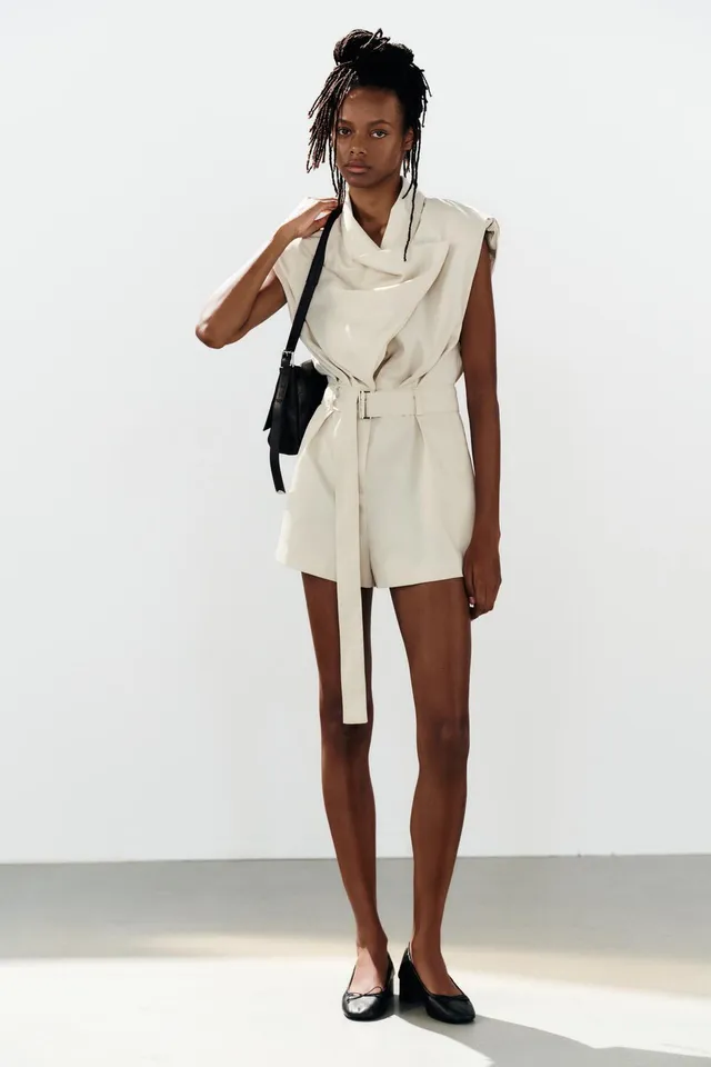 PLAYSUT WITH SHOULDER PADS AND BELT