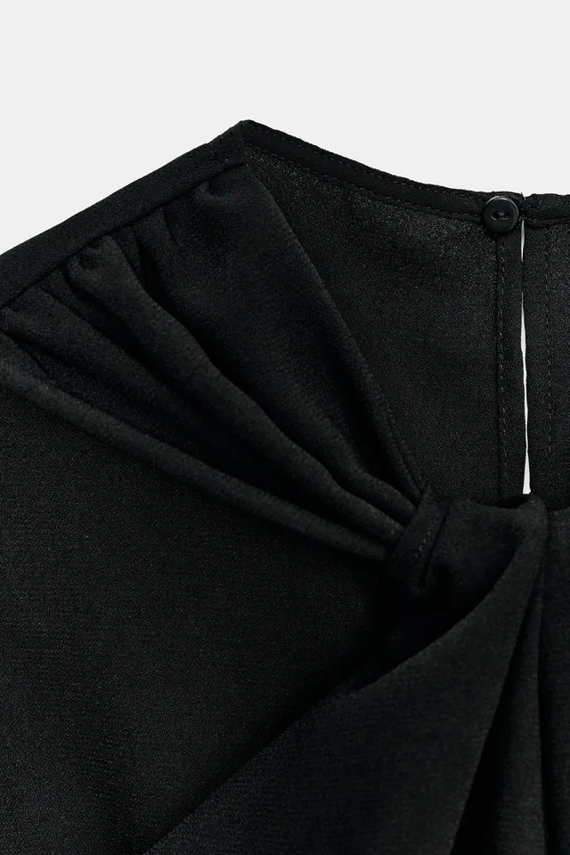 TWIST NECK FLARE JUMPSUIT – image 9