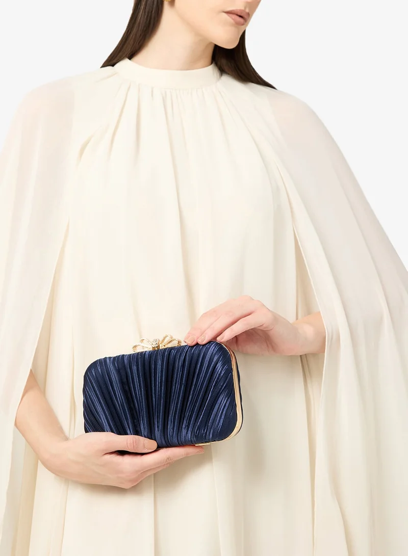 Textured Gold Bow Clutch