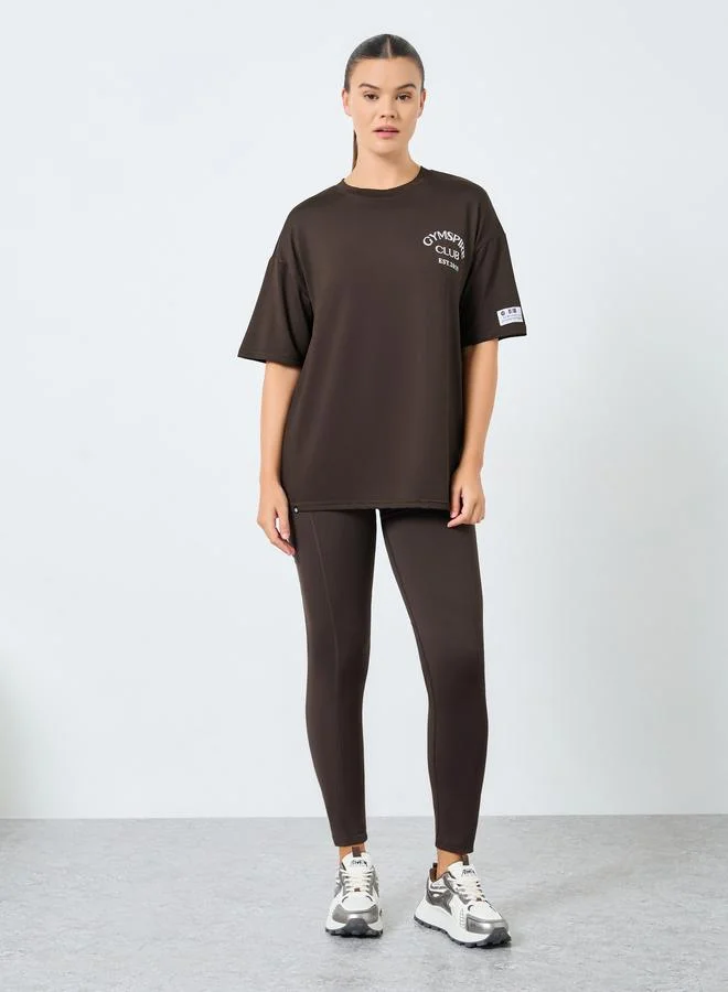 Gymspire Label and Tab Waist Pocket Leggings Brown
