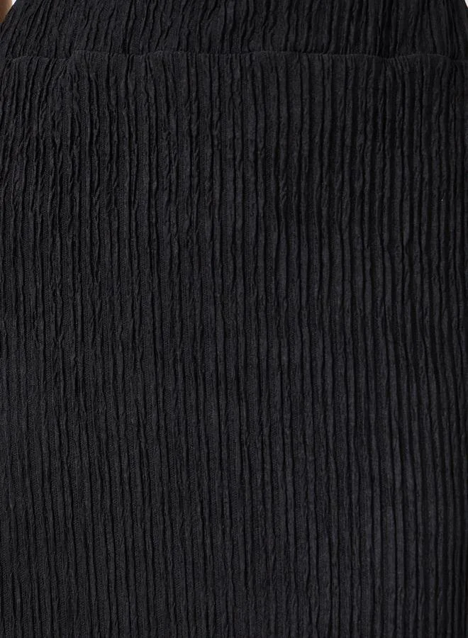 تنورة ميدي نسائية سوداء سادة بنقوش