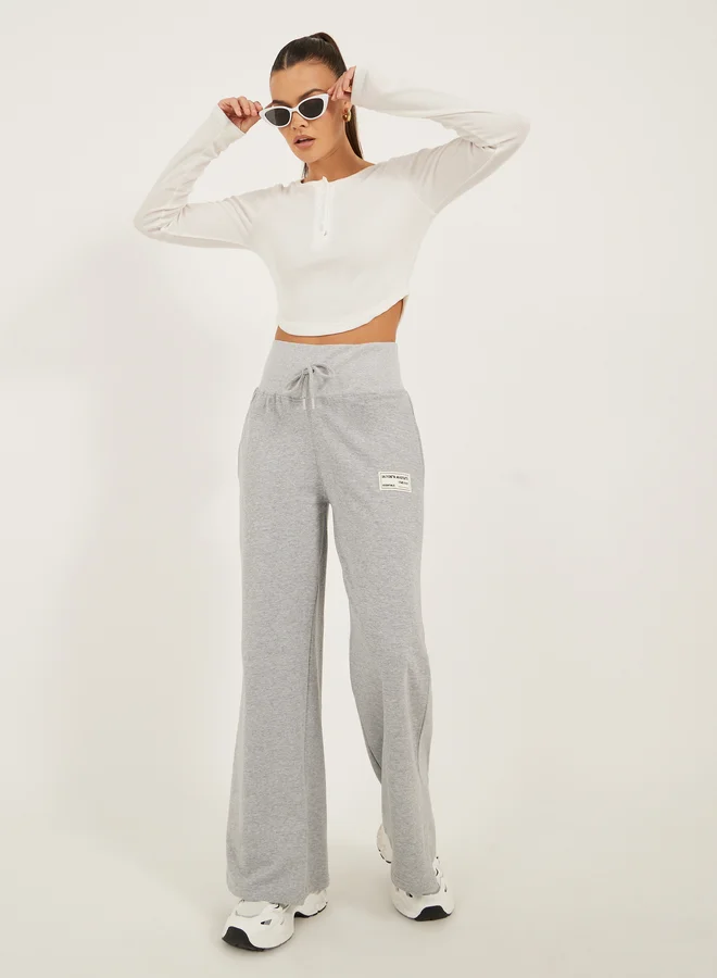Styli Badge Detail Wide Leg Joggers Light Steel Blue