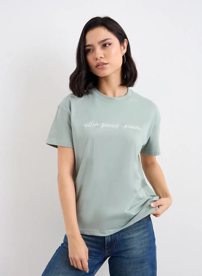 Styli Embroidered Slogan Boxy T-Shirt Soft Green