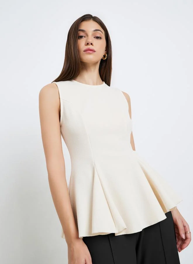 Women's Sleeveless Knit Peplum Top Cream