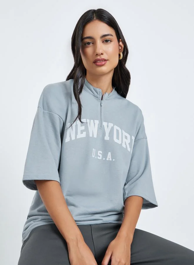 تيشيرت واسع بطبعة جرافيك
