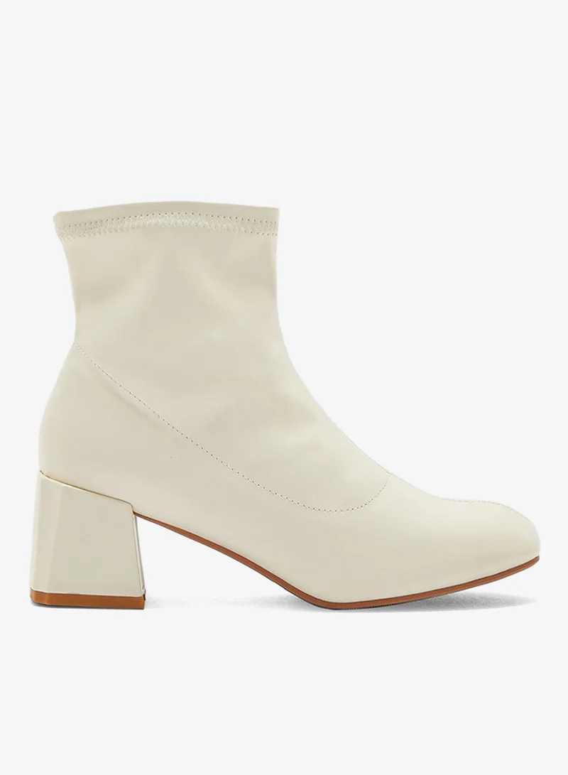 Rounded Point Sock Ankle Boot Cream
