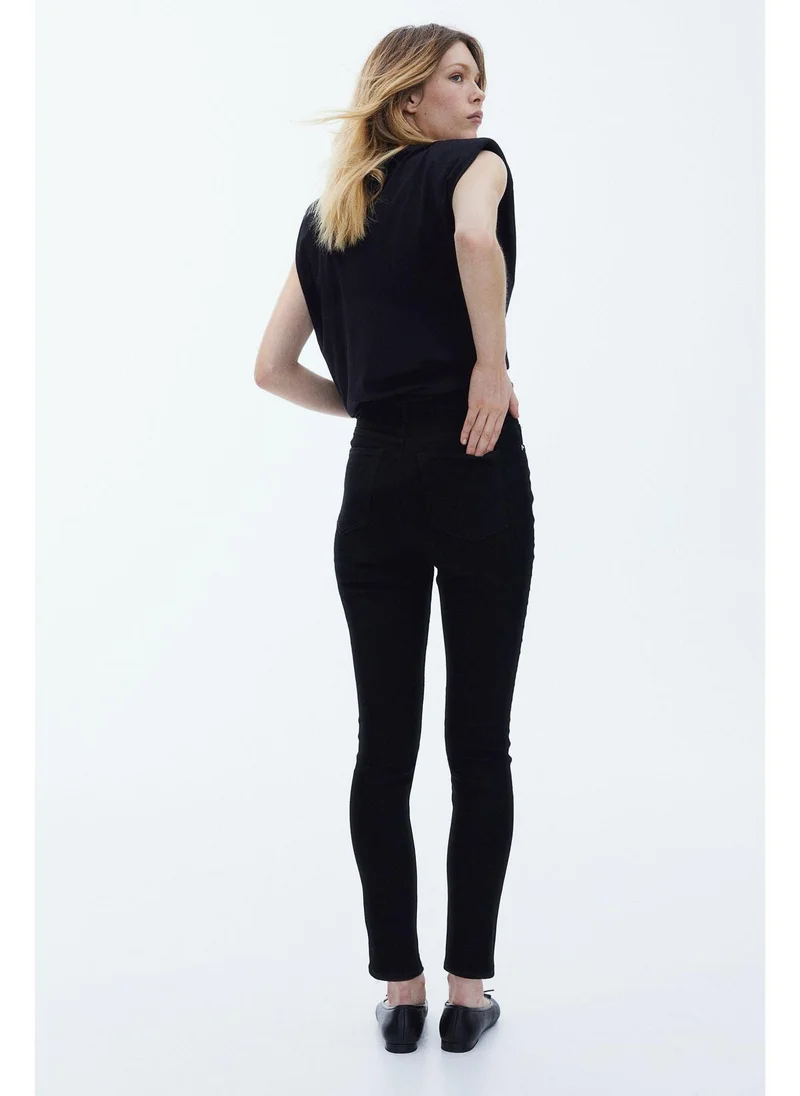 بنطلون جينز سكيني بخصر عالٍ