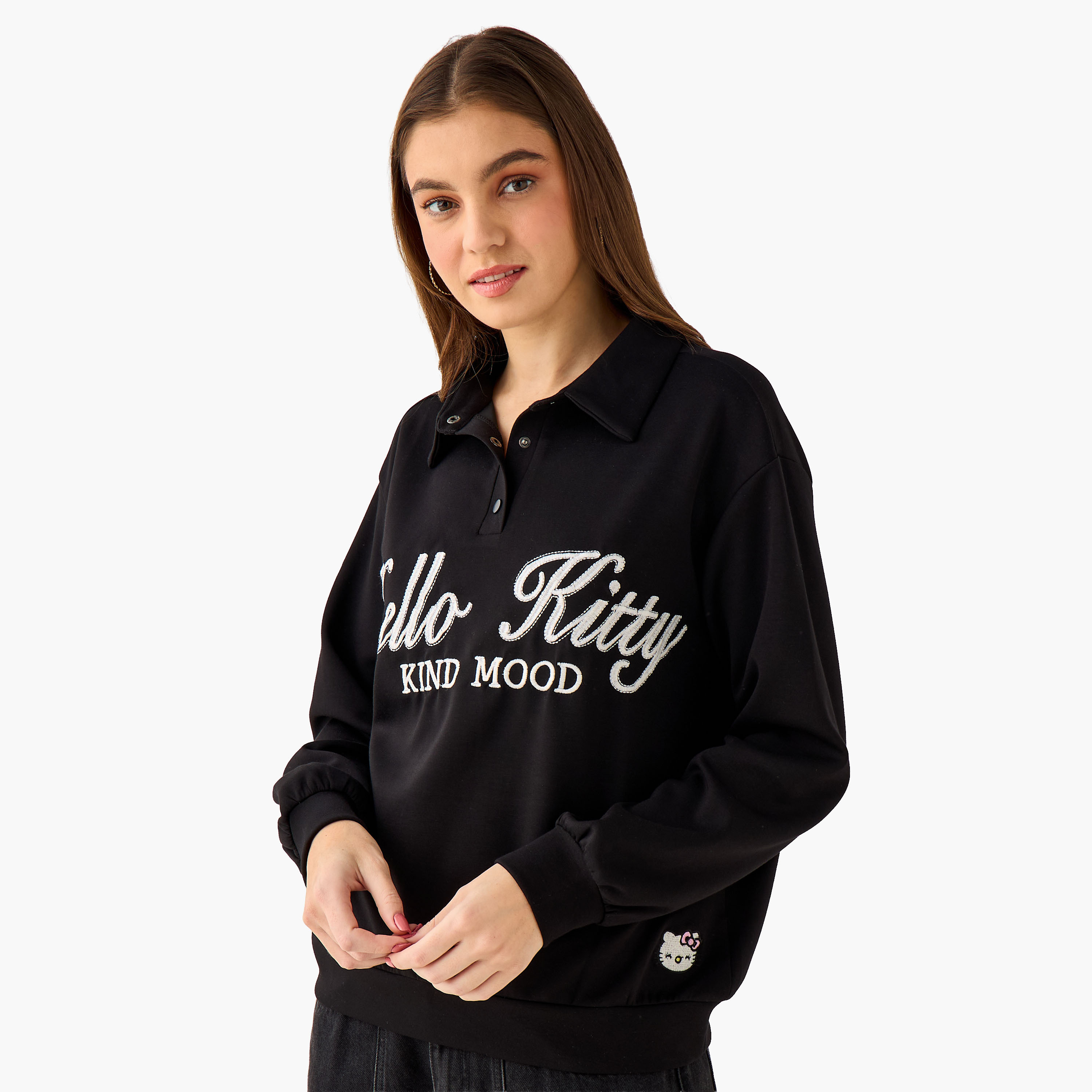 سويت شيرت بياقة بولو Hello Kitty أسود