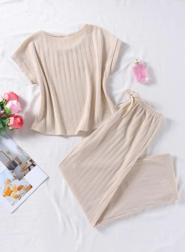 طقم بيجاما من بنطال وبلوزة محبوكة بأكمام قصيرة – صورة 4