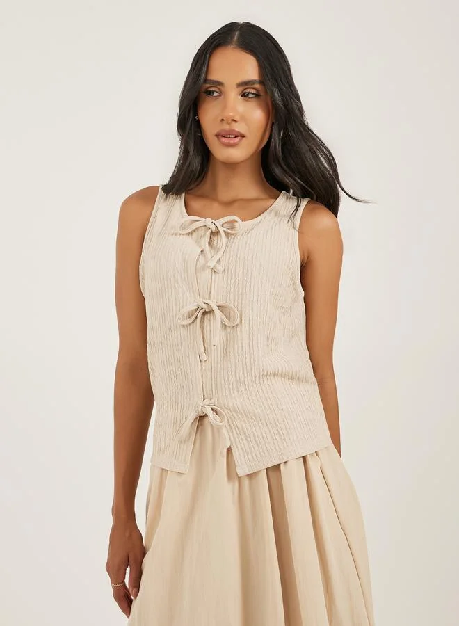 Styli Women Ribbed Tie Front Sleeveless Knit Top Pale Beige